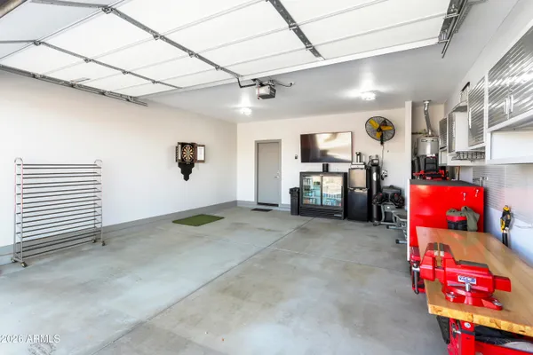 a outdoor space with patio the couches and a fireplace