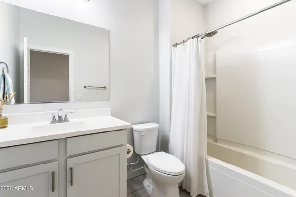 a view of a living room with furniture