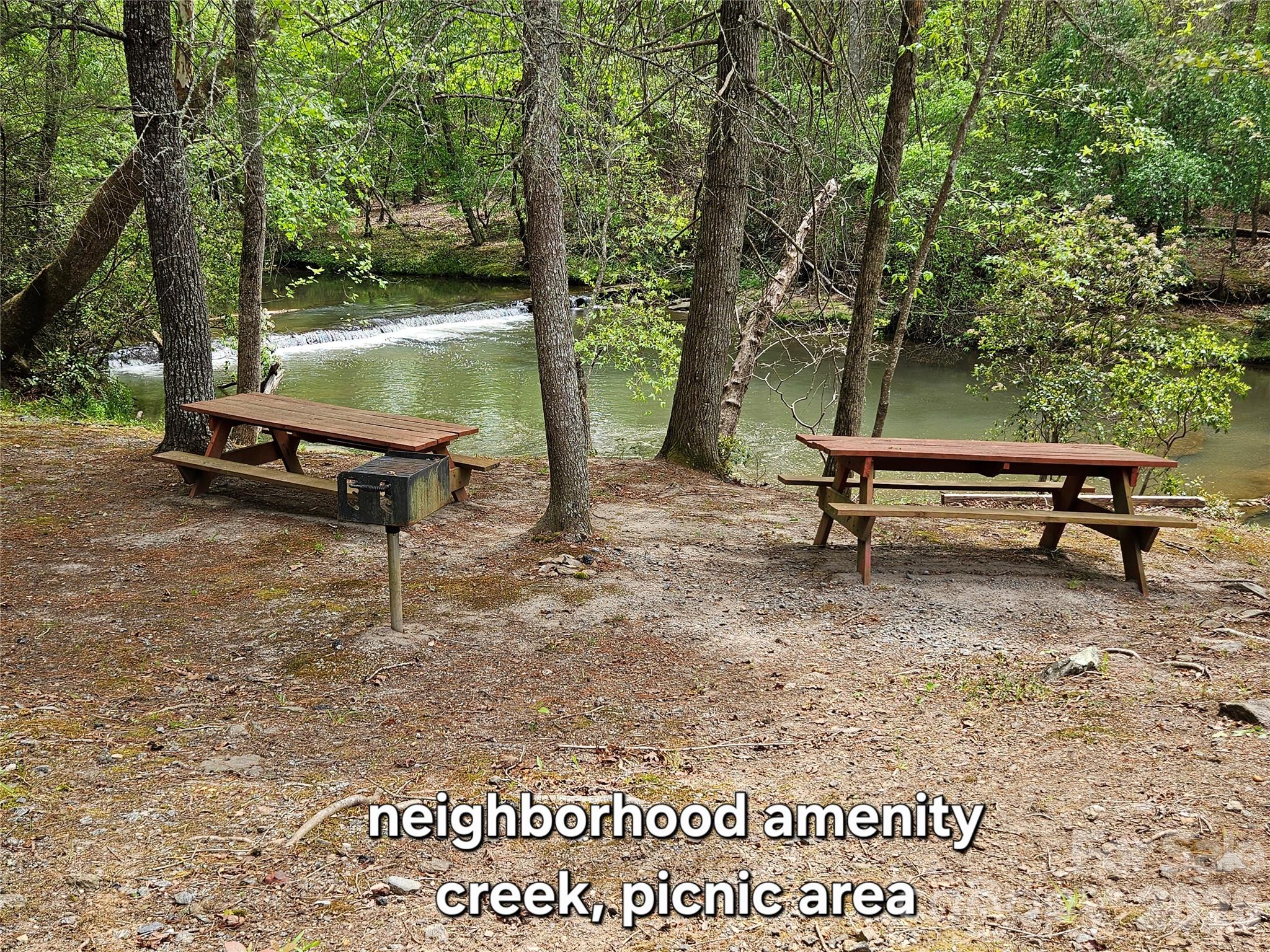 81 North Mill Ridge Nebo, NC 28761 - Photo 24 of 46 a backyard of a house with table and chairs