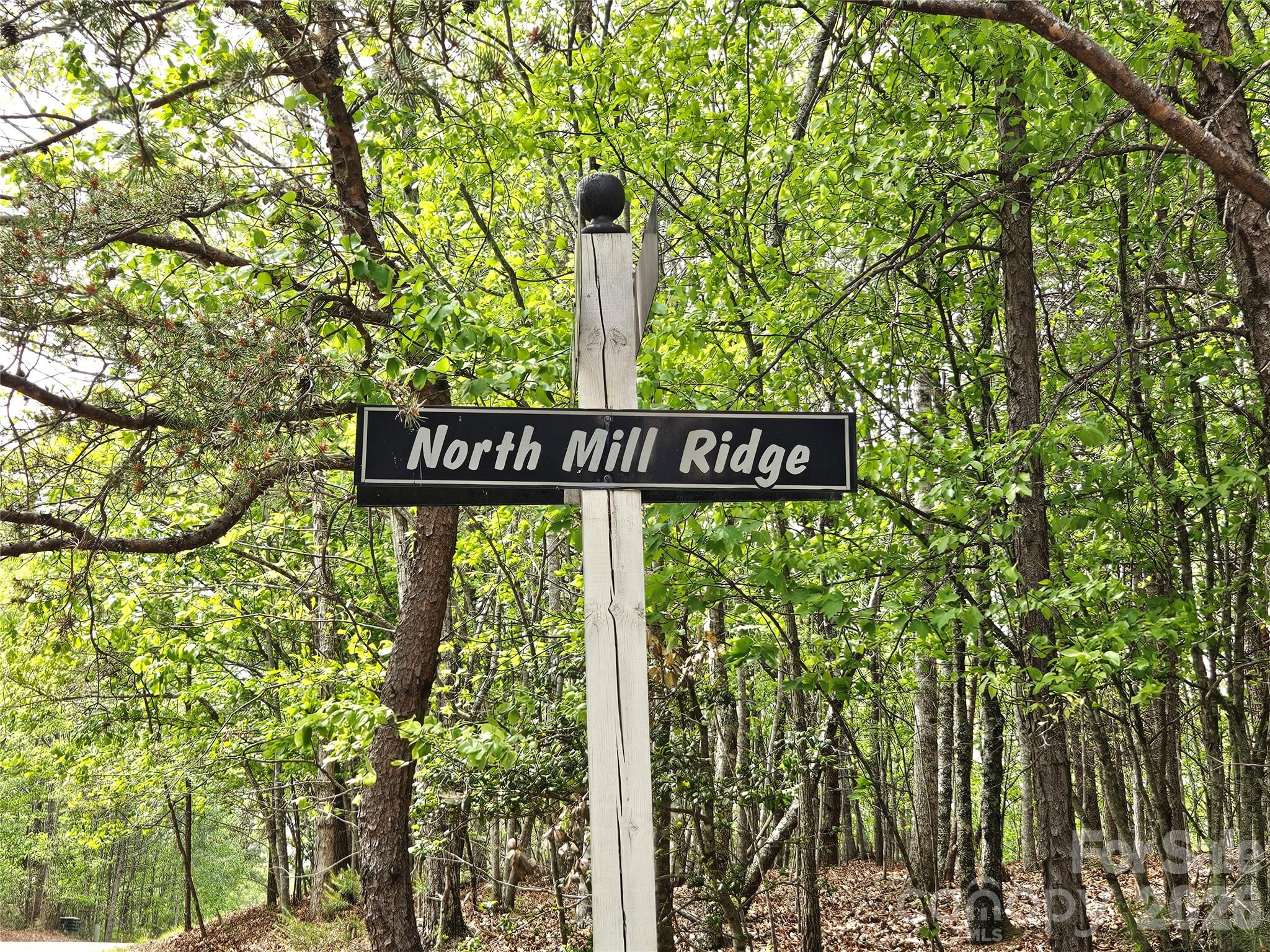 81 North Mill Ridge Nebo, NC 28761 - Photo 33 of 46 a street sign that is sitting on a pole