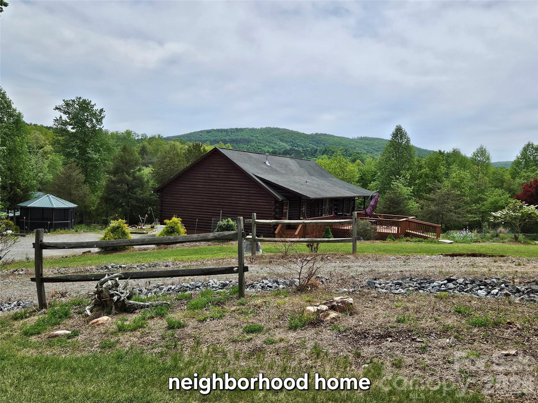81 North Mill Ridge Nebo, NC 28761 - Photo 36 of 46 a house view with a backyard space