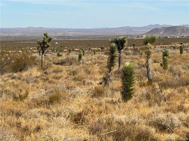 a view of lake and mountain