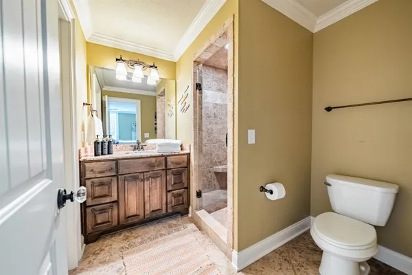 a view of a porch with wooden floor a fence and a porch