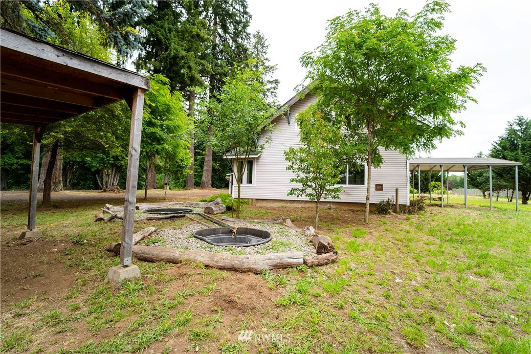 237 Hatchery Road Chehalis, WA 98532 - Photo 23 of 30 a view of a house with swimming pool and sitting area