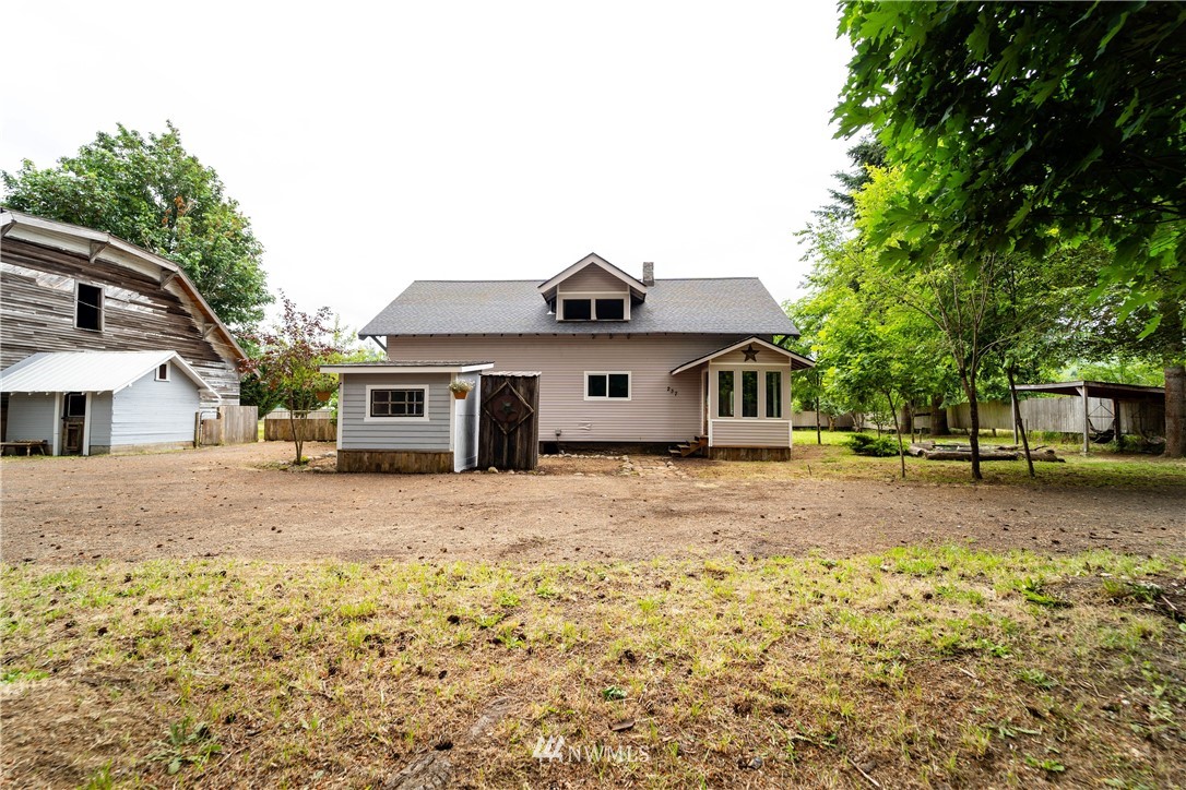 237 Hatchery Road Chehalis, WA 98532 - Photo 5 of 30 a front view of a house with a yard and garage