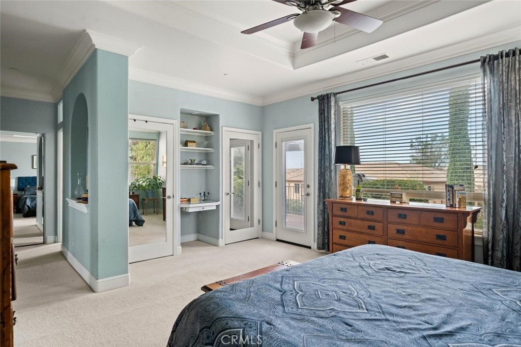 3290 Summit Ridge Terrace Chico, CA 95928 - Photo 26 of 60 The primary suite has a door leading to the back deck/patio area that overlooks the pool and backyard. There are also two closets located in the primary room, as well as a third closet near the primary bathroom.