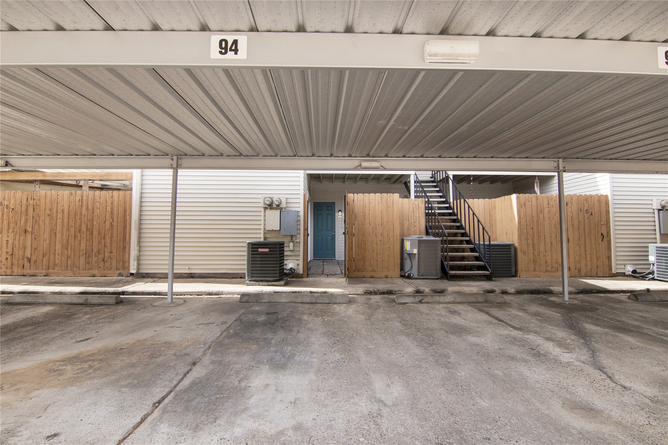 6401 Deihl Road, Unit 606 Houston, TX 77092 - Photo 19 of 21 a view of an empty room with stairs