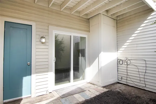 a view of a porch with a door