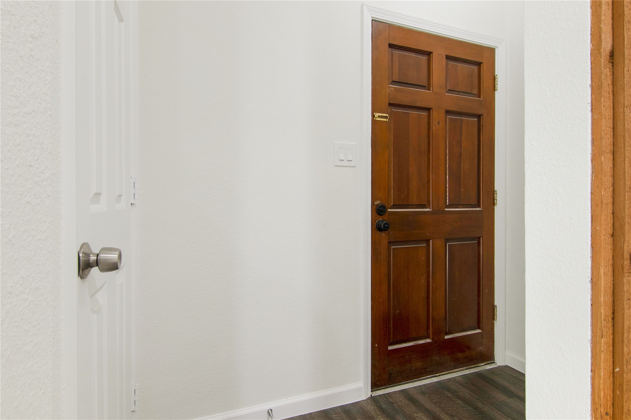 6401 Deihl Road, Unit 606 Houston, TX 77092 - Photo 4 of 21 wooden floor and closet in a bathroom