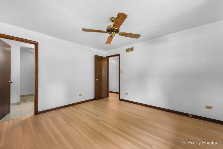 195 Westgate Drive Elgin, IL 60123 - Photo 16 of 39 a view of empty room with wooden floor