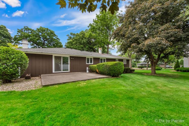 195 Westgate Drive Elgin, IL 60123 - Photo 34 of 39 a view of a house with a yard and a garden
