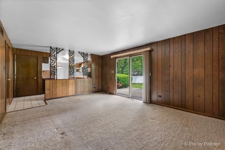 195 Westgate Drive Elgin, IL 60123 - Photo 9 of 39 a view of an empty room with a window
