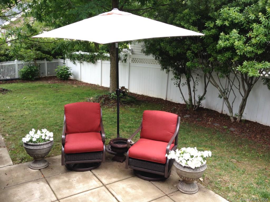 411 Bull Finch Bend Fort Mill, SC 29708 - Photo 19 of 22 a view of a yard with furniture and a fire pit