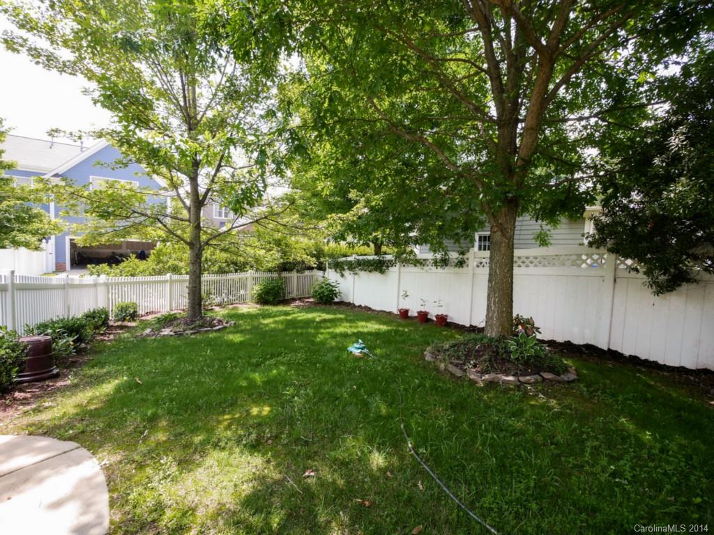 411 Bull Finch Bend Fort Mill, SC 29708 - Photo 20 of 22 a view of a backyard