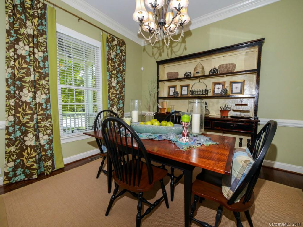 411 Bull Finch Bend Fort Mill, SC 29708 - Photo 9 of 22 a dining room with furniture and window