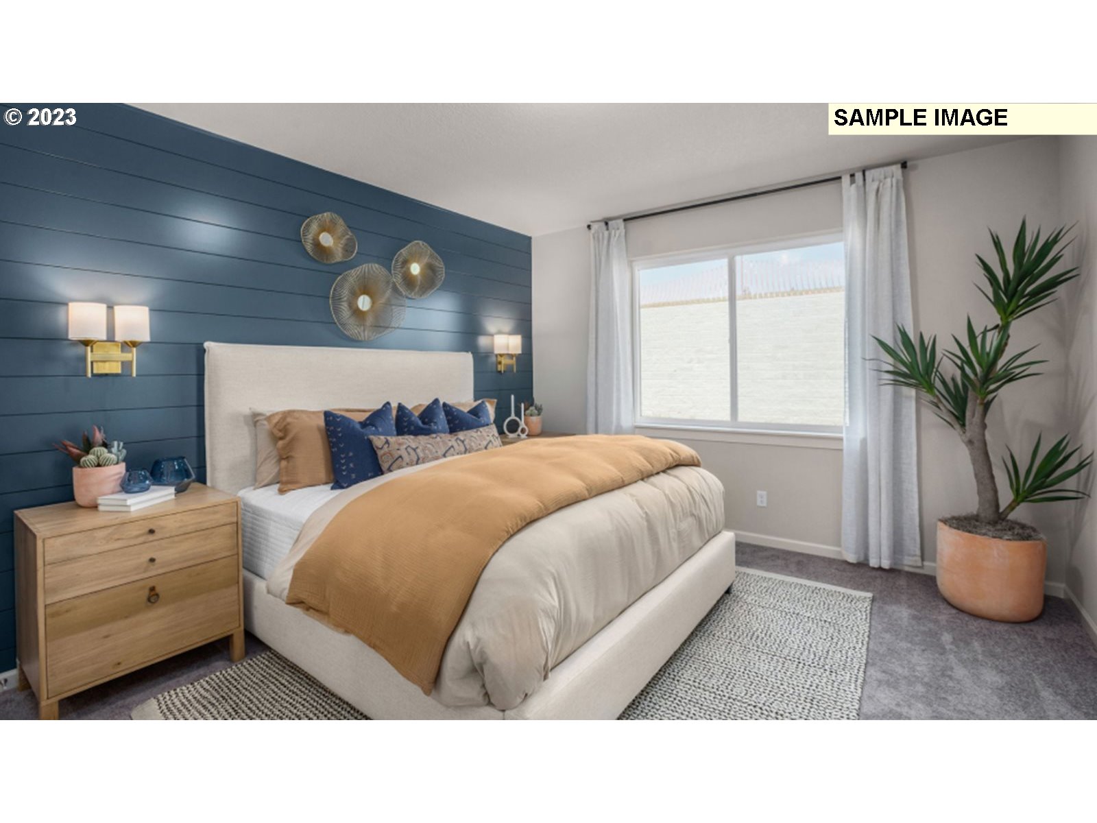 2720 South 6th Way Ridgefield, WA 98642 - Photo 6 of 9 a room with a bed window and potted plant