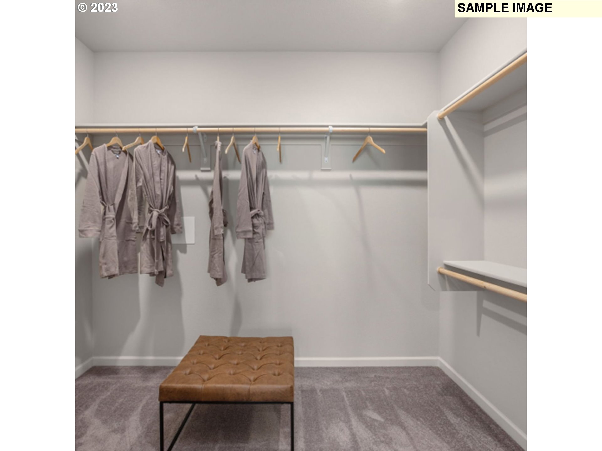 2720 South 6th Way Ridgefield, WA 98642 - Photo 8 of 9 a view of walk in closet with clothes and shoes