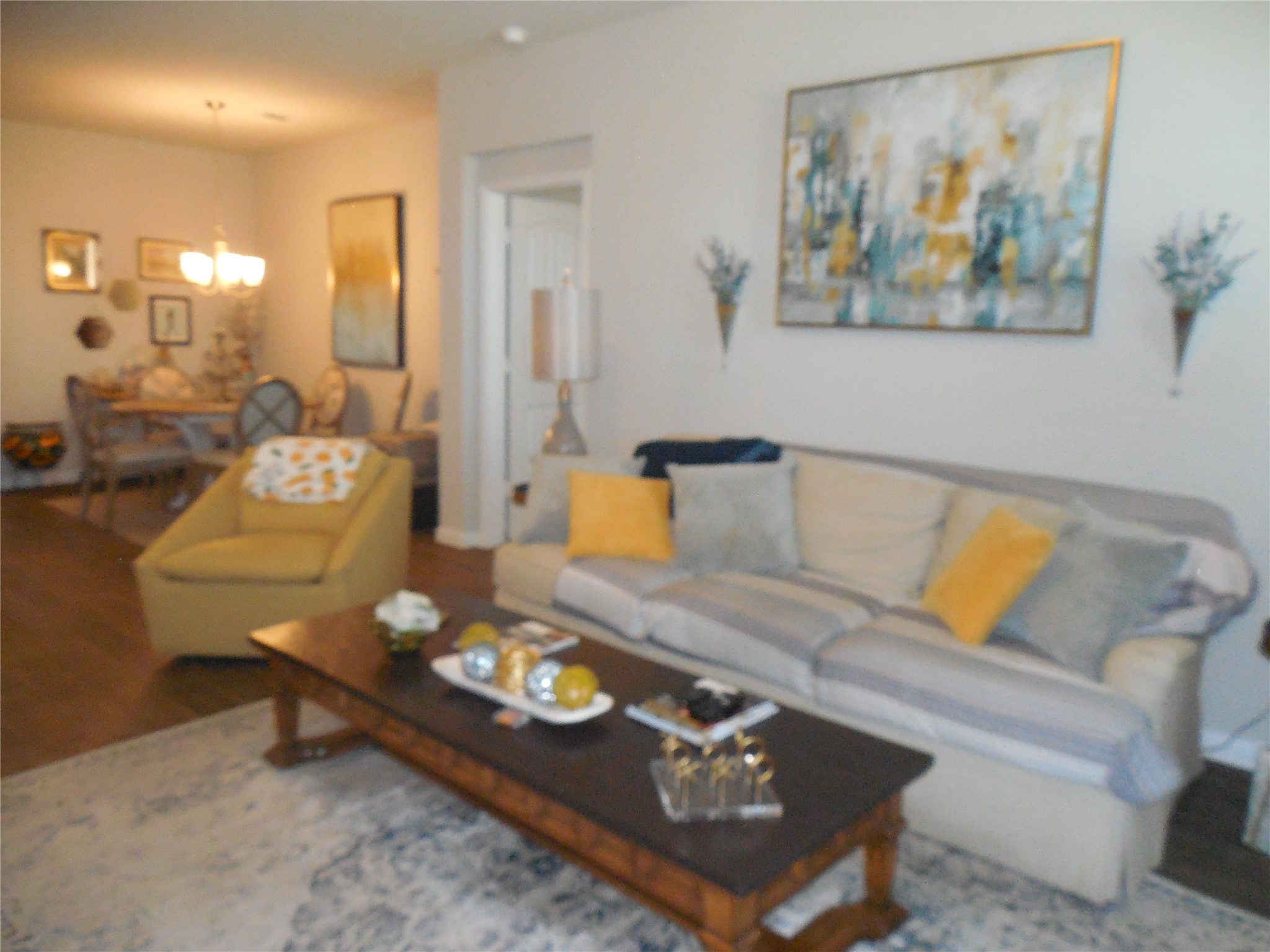 1009 Ferryman Drive Georgetown, TX 78626 - Photo 14 of 24 a living room with furniture and wooden floor