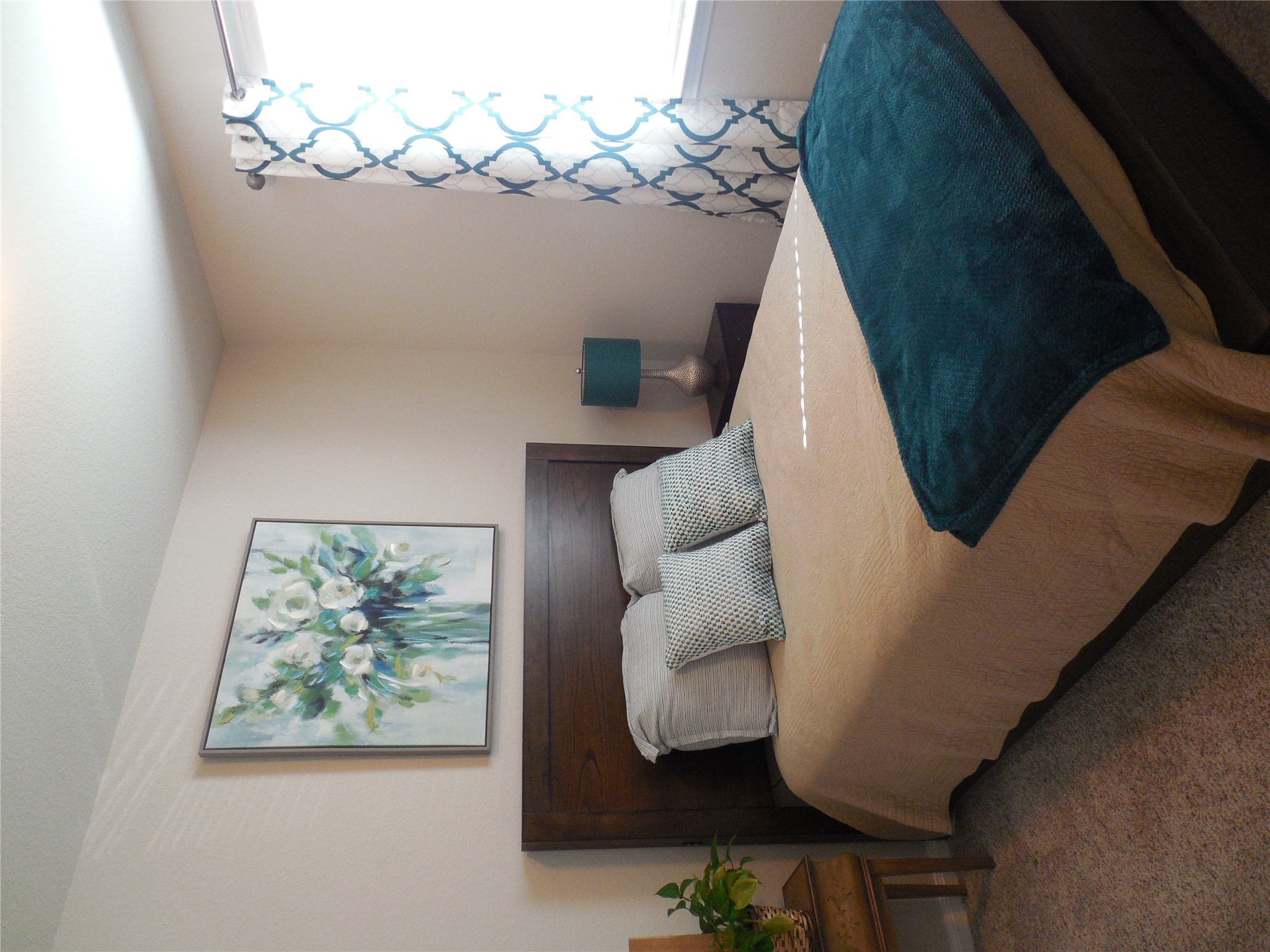 1009 Ferryman Drive Georgetown, TX 78626 - Photo 6 of 24 a bedroom with a bed and a window