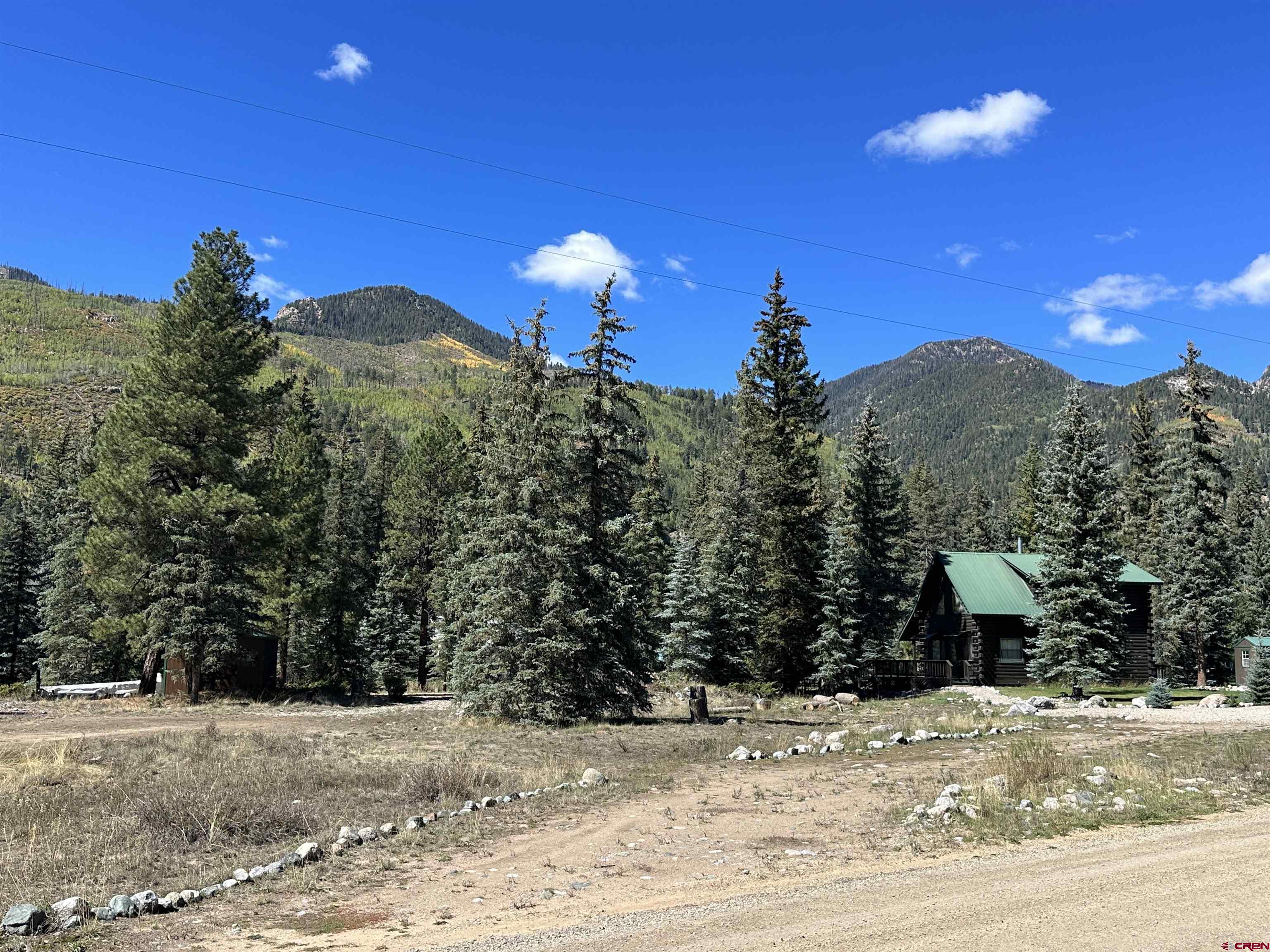 264 Ponderosa Homes Road Bayfield, CO 81122 - Photo 2 of 7 a view of a house with a backyard of a house
