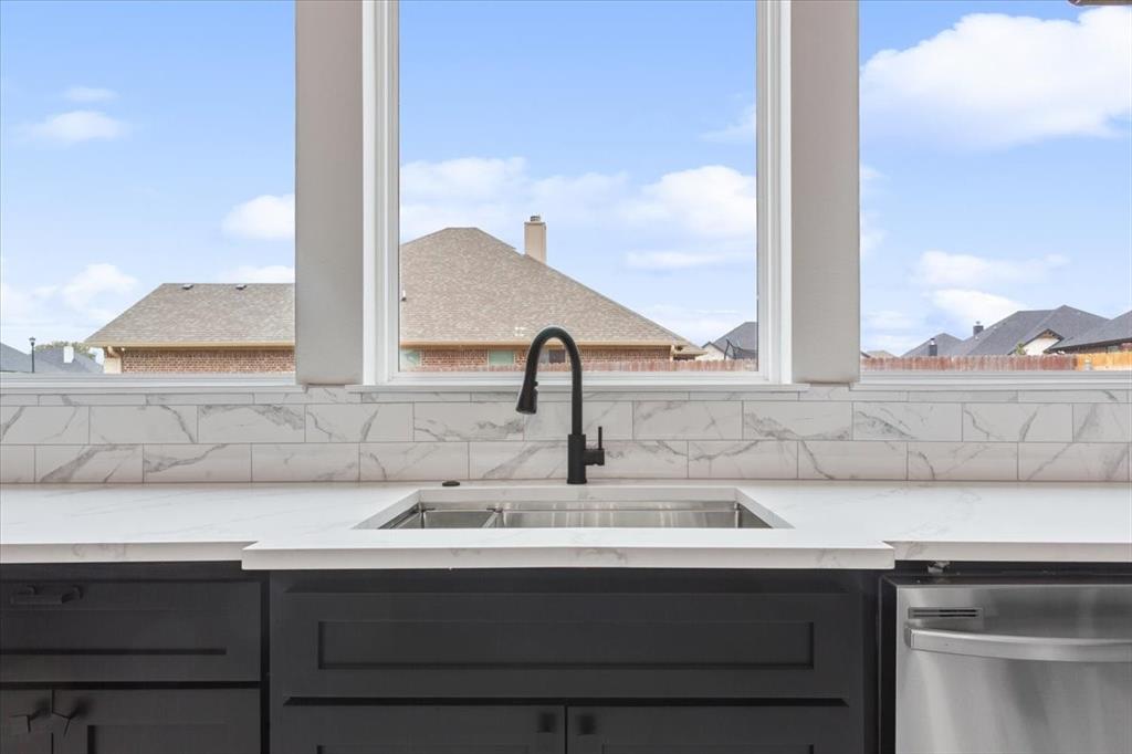 959 Gallant Fox Hewitt, TX 76643 - Photo 13 of 38 a view with a sink and a mirror