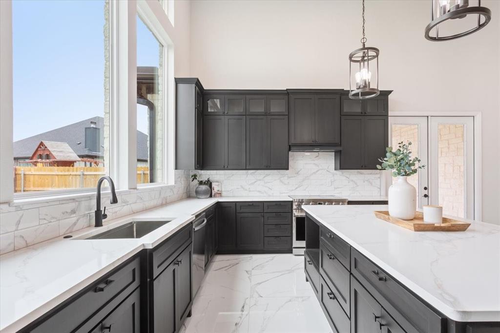 959 Gallant Fox Hewitt, TX 76643 - Photo 14 of 38 a kitchen with a sink and stove