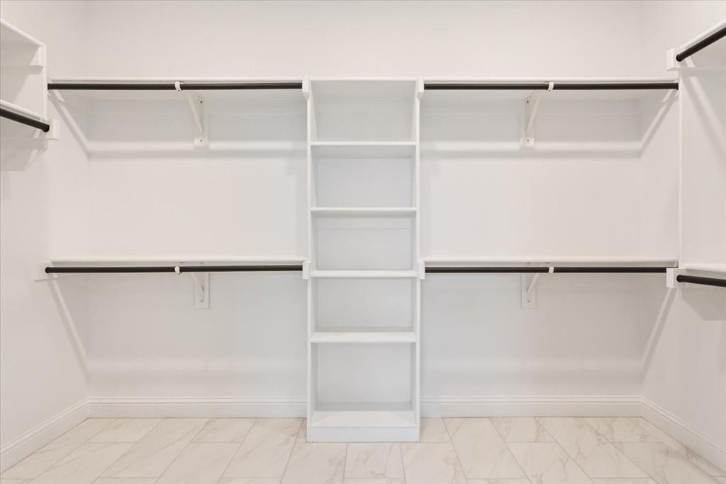 959 Gallant Fox Hewitt, TX 76643 - Photo 22 of 38 a view of an empty walk in closet