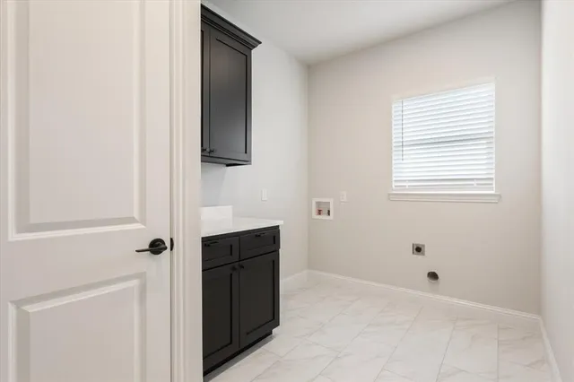 a bathroom with a bathtub and a sink