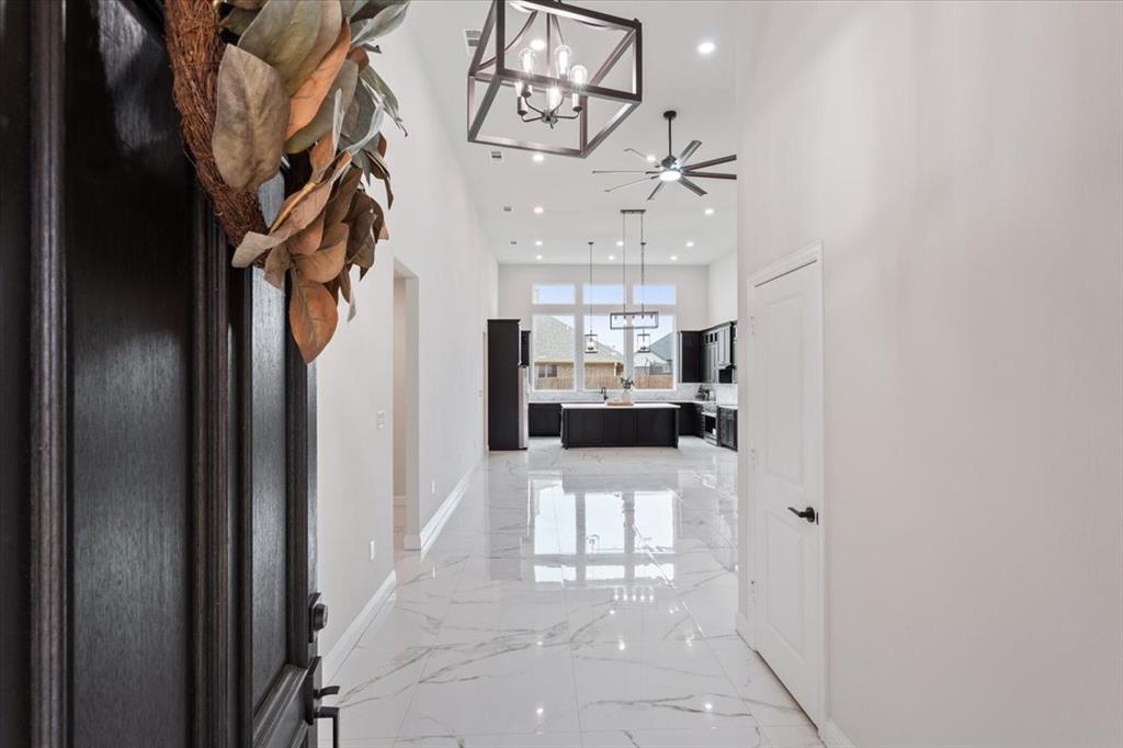 959 Gallant Fox Hewitt, TX 76643 - Photo 3 of 38 a view of a kitchen and electric equipment