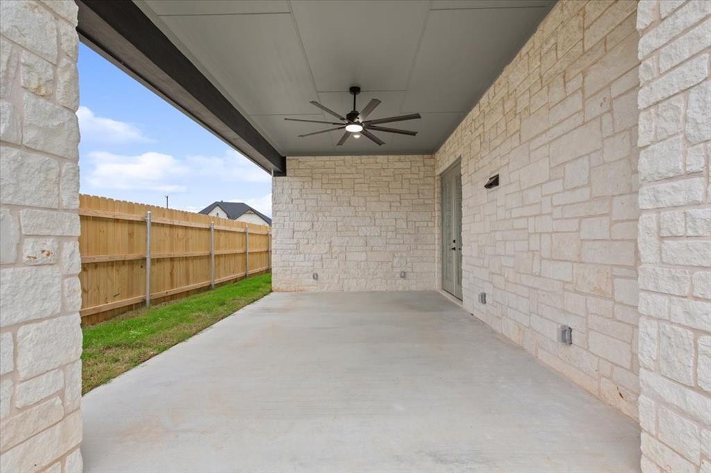 959 Gallant Fox Hewitt, TX 76643 - Photo 31 of 38 a view of a terrace with a garden