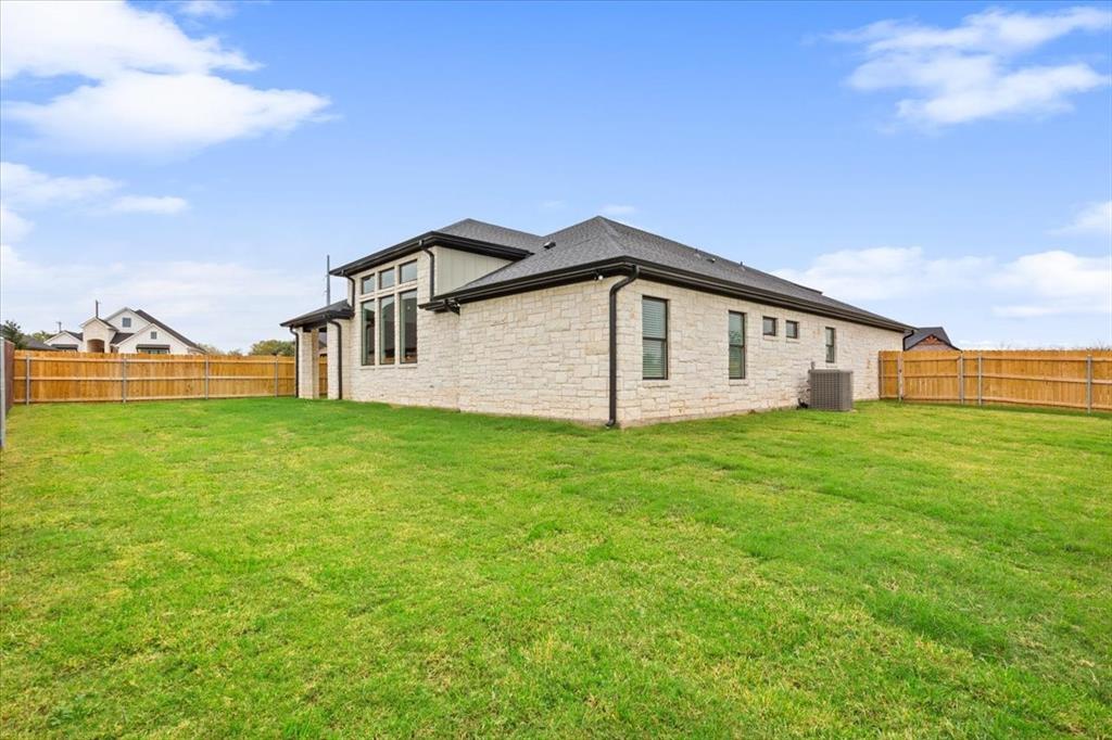 959 Gallant Fox Hewitt, TX 76643 - Photo 34 of 38 a view of a house with a big yard