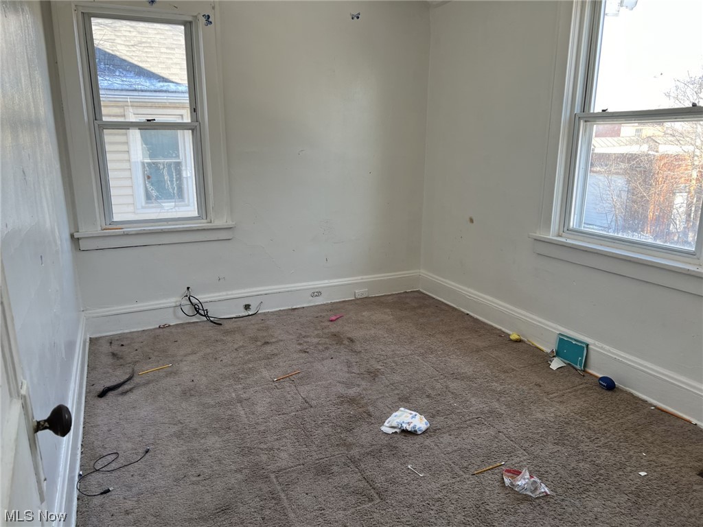 14740 Wemple Road Cleveland, OH 44110 - Photo 10 of 11 View of carpeted spare room