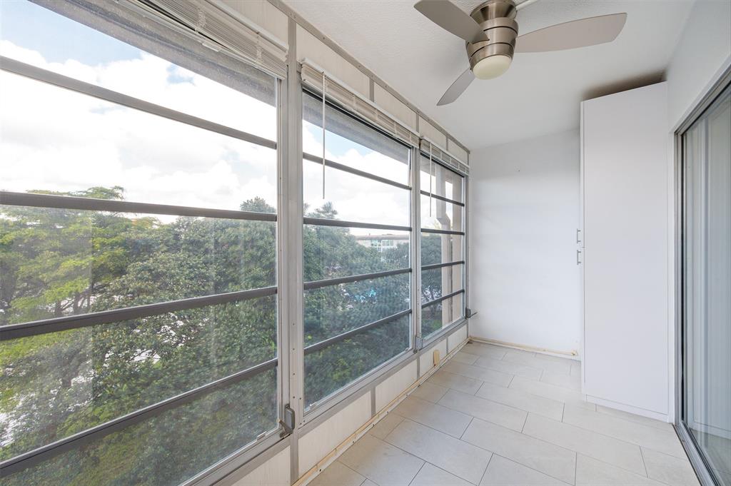 1703 Andros Isle, Unit G4 Coconut Creek, FL 33066 - Photo 16 of 33 a view of a room with a large window