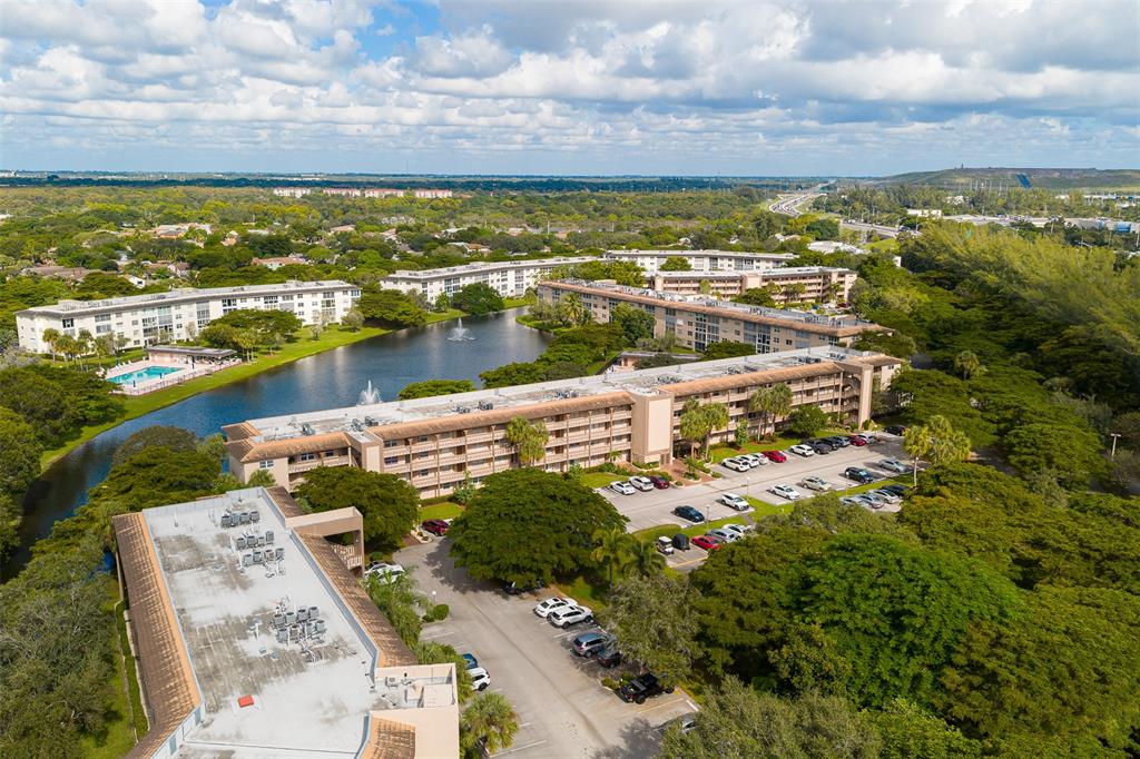 1703 Andros Isle, Unit G4 Coconut Creek, FL 33066 - Photo 20 of 33 a view of lake with city view