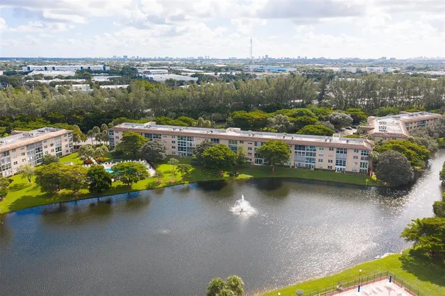 an aerial view of lake and city