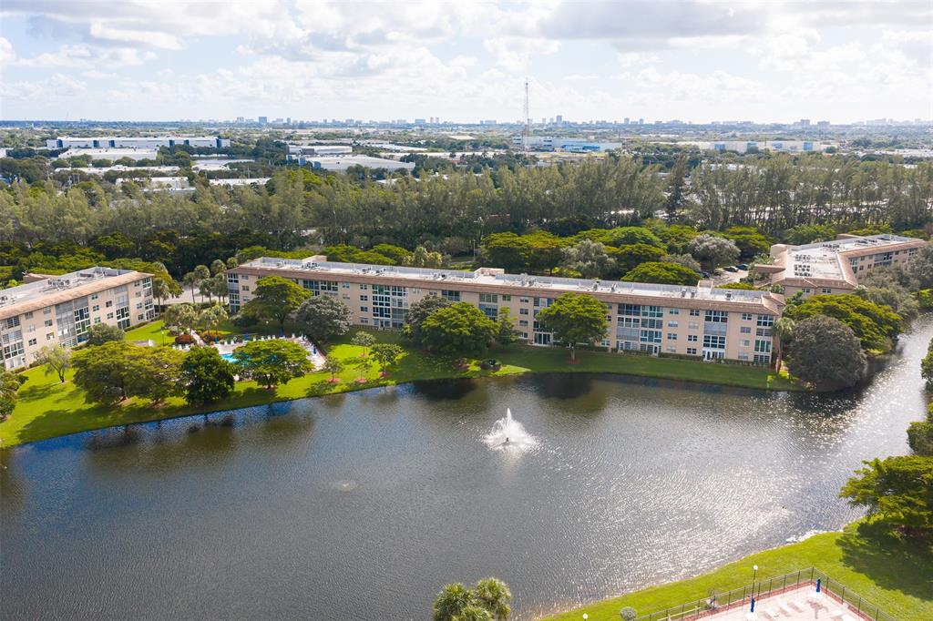 1703 Andros Isle, Unit G4 Coconut Creek, FL 33066 - Photo 22 of 33 an aerial view of lake and city