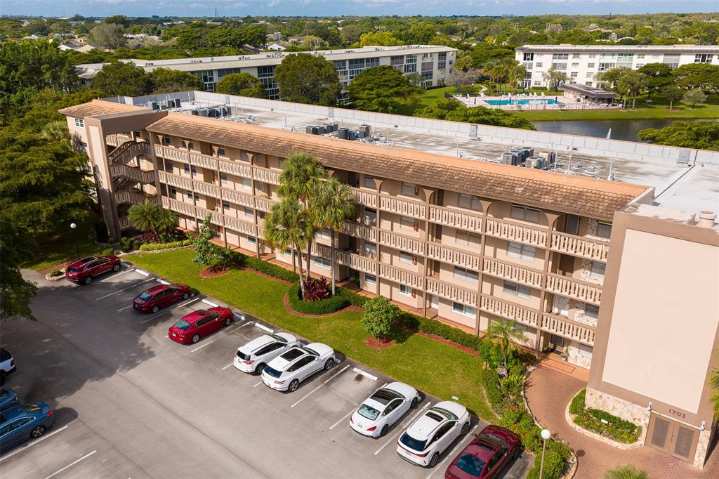 1703 Andros Isle, Unit G4 Coconut Creek, FL 33066 - Photo 25 of 33 an aerial view of a house with a ocean view