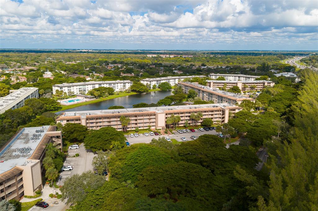 1703 Andros Isle, Unit G4 Coconut Creek, FL 33066 - Photo 26 of 33 a view of a city