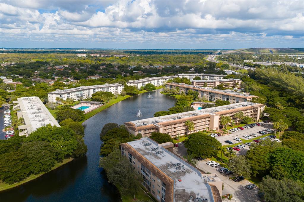 1703 Andros Isle, Unit G4 Coconut Creek, FL 33066 - Photo 27 of 33 a view of a city