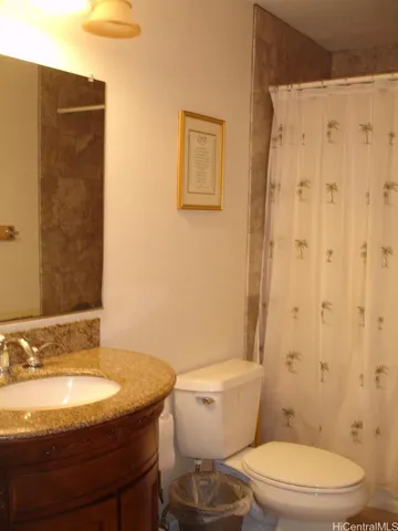 a bathroom with a sink and a toilet