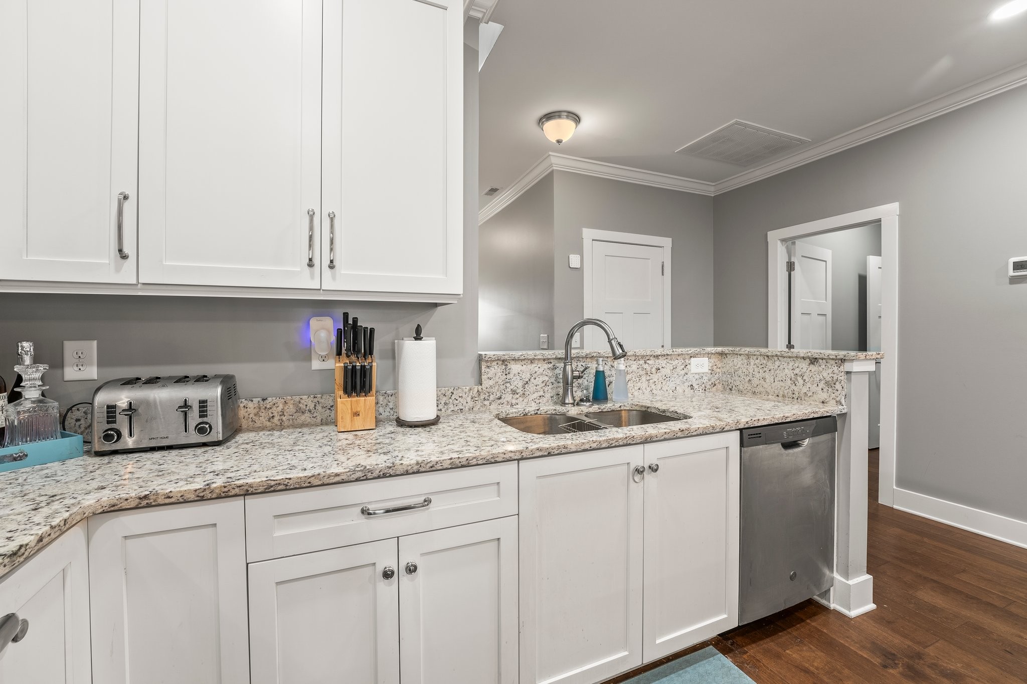 105 Island Way Winchester, TN 37398 - Photo 12 of 41 a kitchen with granite countertop white cabinets and sink