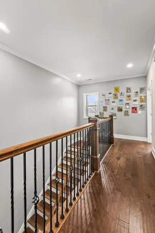 a view of a hallway with workspace and entryway