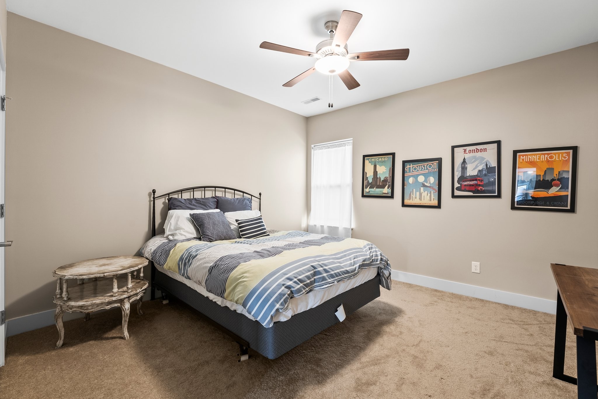 105 Island Way Winchester, TN 37398 - Photo 35 of 41 a spacious bedroom with a bed and a chandelier