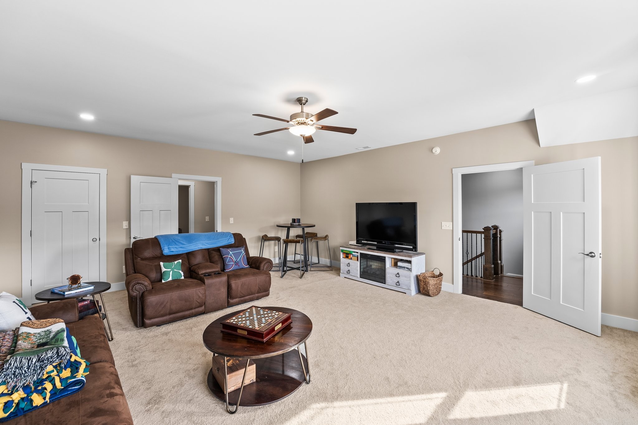 105 Island Way Winchester, TN 37398 - Photo 5 of 41 a living room with furniture and a flat screen tv