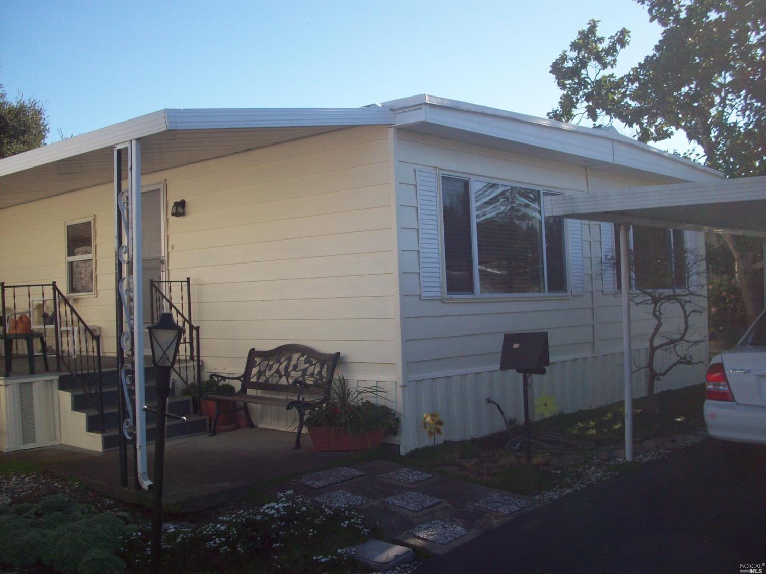 75 Pixy Place, Unit 75 Santa Rosa, CA 95409 - Photo 1 of 1 a front view of a house with parking