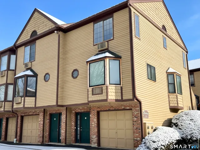 a front view of a house with a balcony