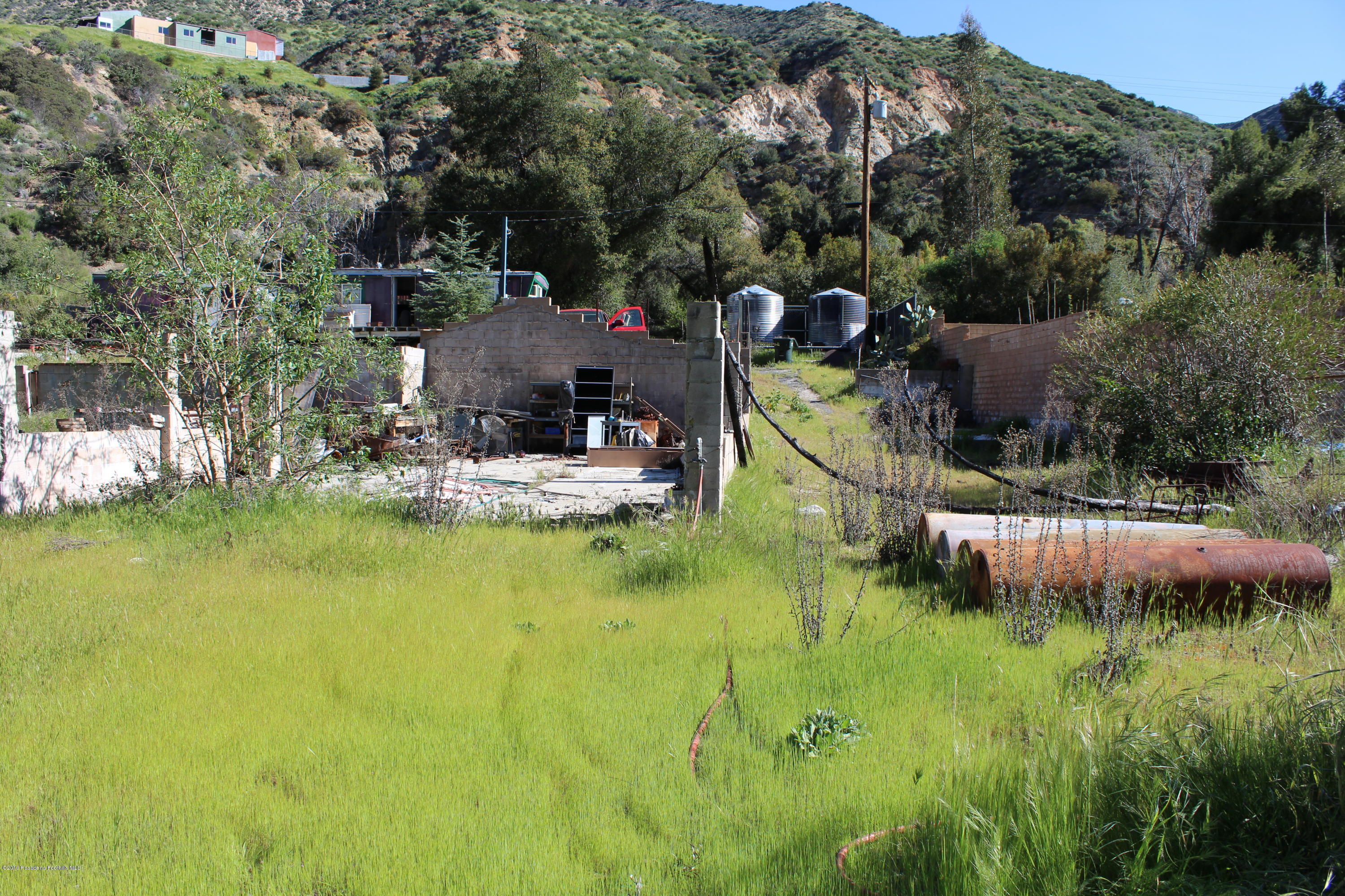 2300 Stonyvale Road Tujunga, CA 91042 - Photo 11 of 15 a view of a house with pool and a yard