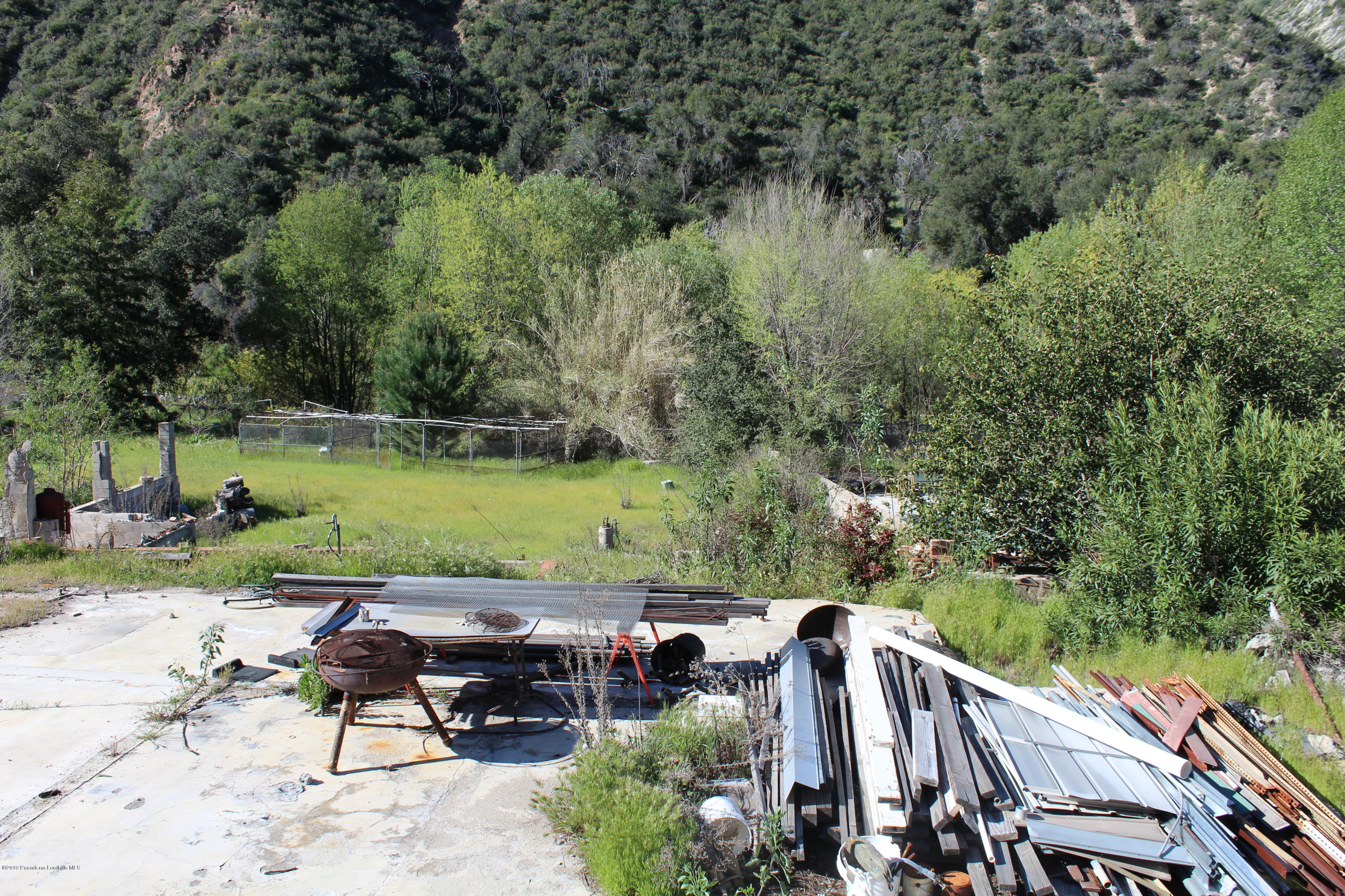 2300 Stonyvale Road Tujunga, CA 91042 - Photo 10 of 15 an outdoor view of a garden with sitting area