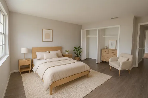 a bedroom with bed and windows