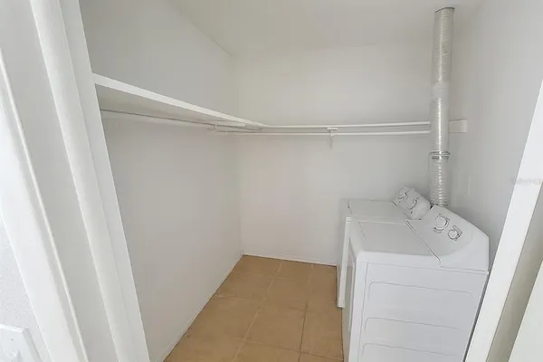 a view of a room with racks on the wall